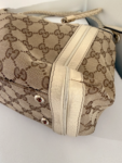 Gucci GG Canvas Bella Shoulder Bag with Bamboo Tassel