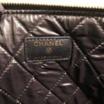Chanel Black Camelia Lambskin Clutch